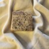 African2 soap bar with flecks of black and deep red