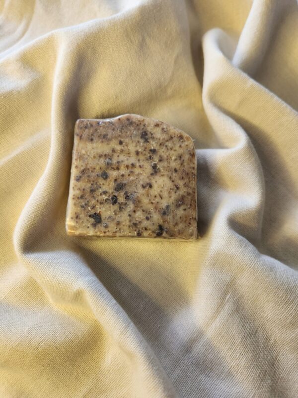 African2 soap bar with flecks of black and deep red