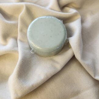 pale green-blue shampoo bar