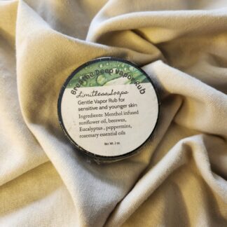 2 ounce salve container with product label