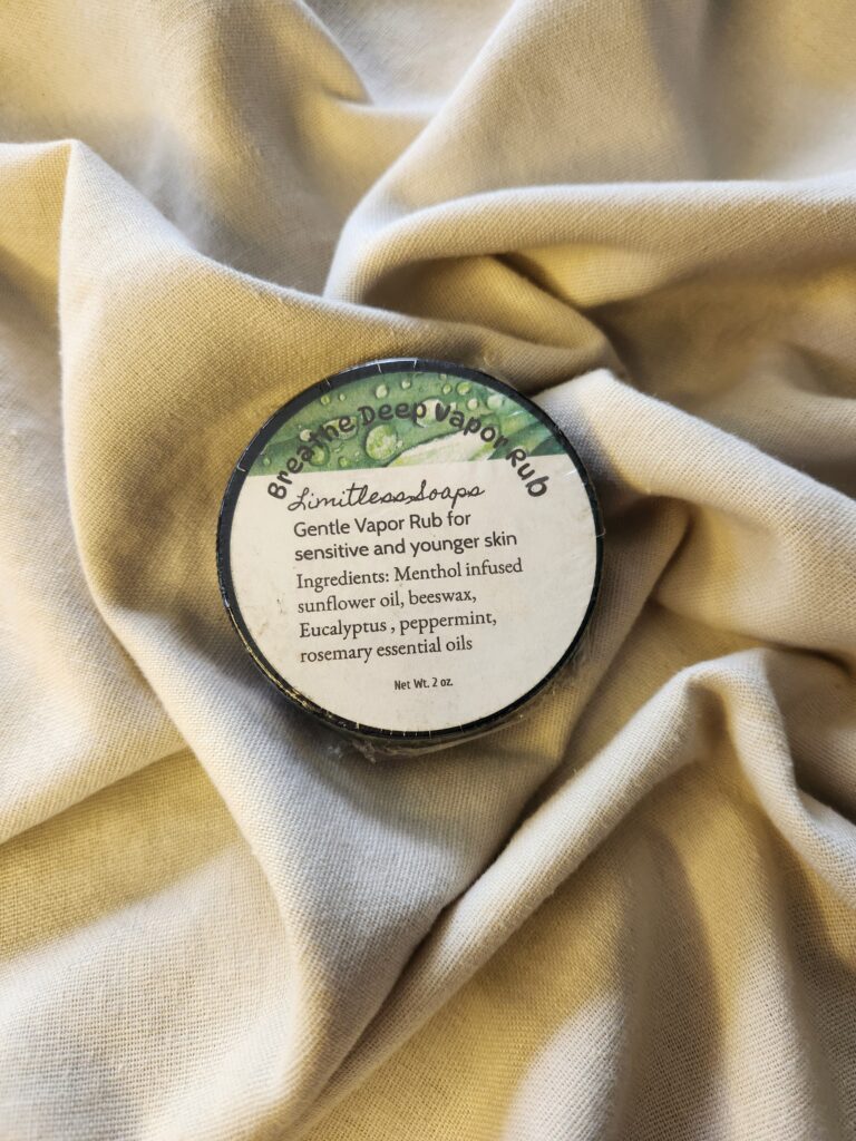 2 ounce salve container with product label