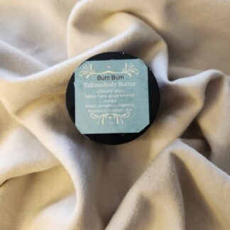 2 ounce salve container with product label