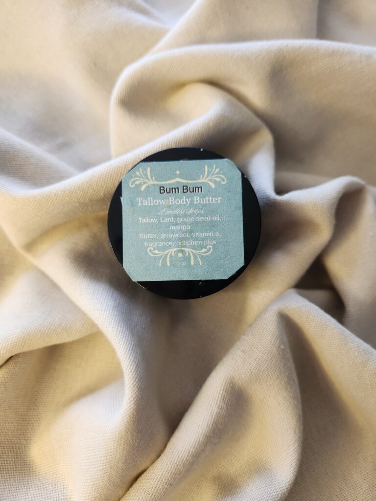 2 ounce salve container with product label
