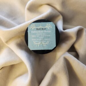 2 ounce salve container with product label
