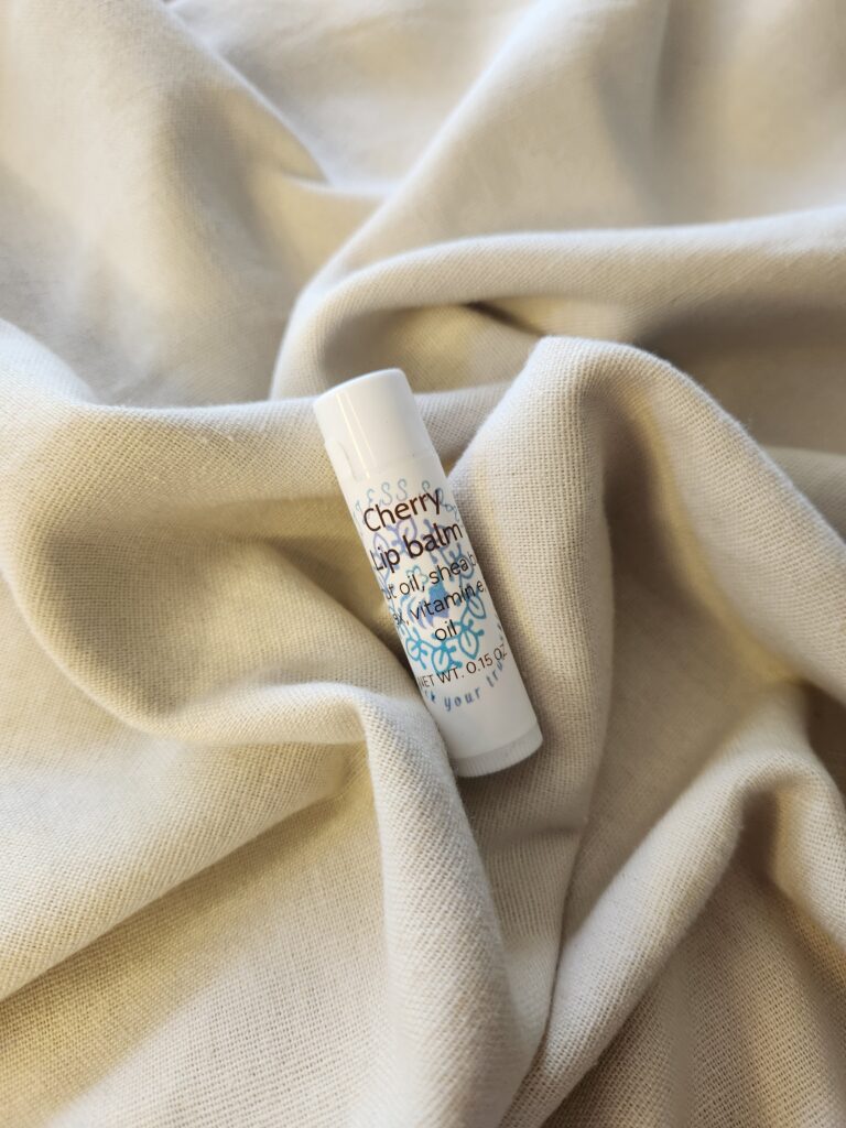 lip balm container with product label