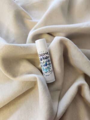 lip balm container with product label