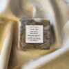 ForestEscape1 soap bar with swirls of deep red, brown, and black with product label