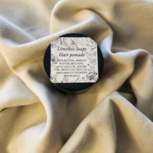 2 ounce salve container with product label