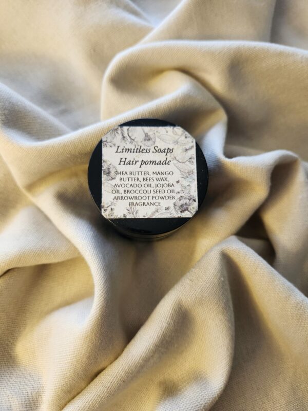 2 ounce salve container with product label