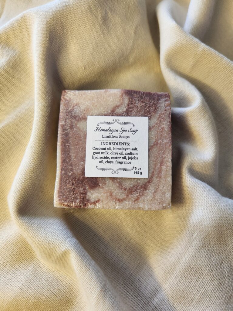 soap bar with swirls of deep red with product label