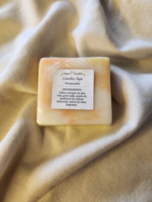 soap bar with swirls of orange and yellow with product label