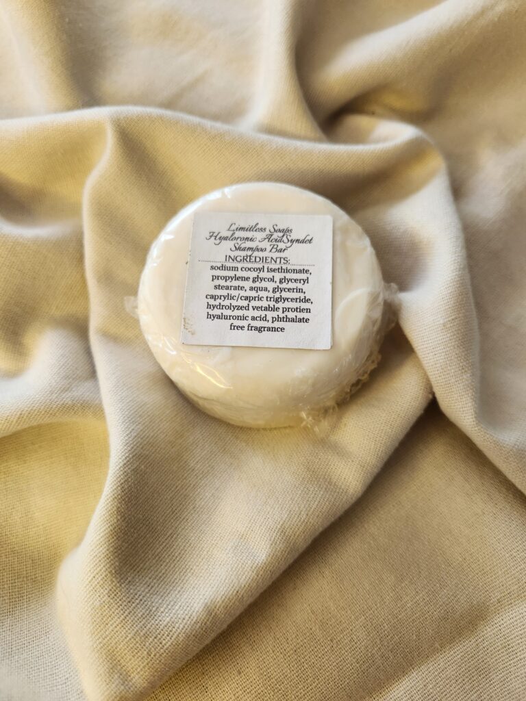 white shampoo bar with product label