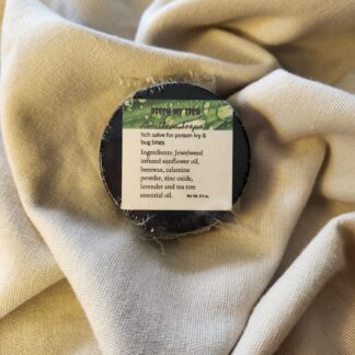 0.9 ounce salve container with product label