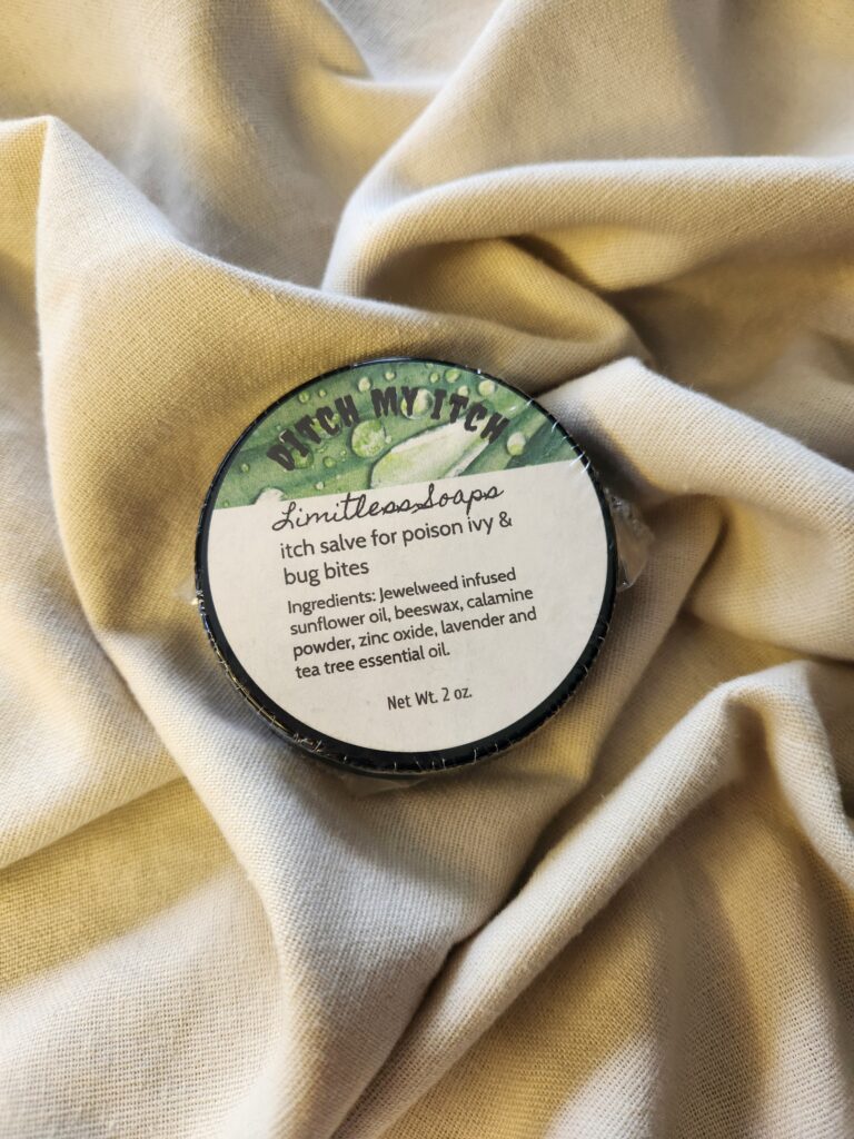 2 ounce salve container with product label