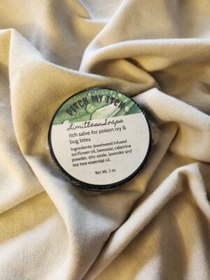 2 ounce salve container with product label