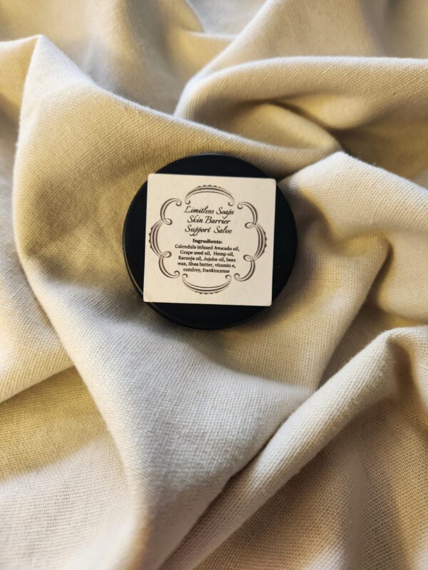 0.9 ounce salve container with product label