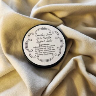 2 ounce salve container with product label