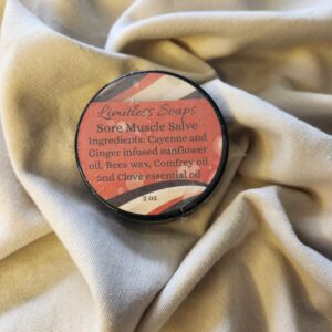 2 ounce salve container with product label