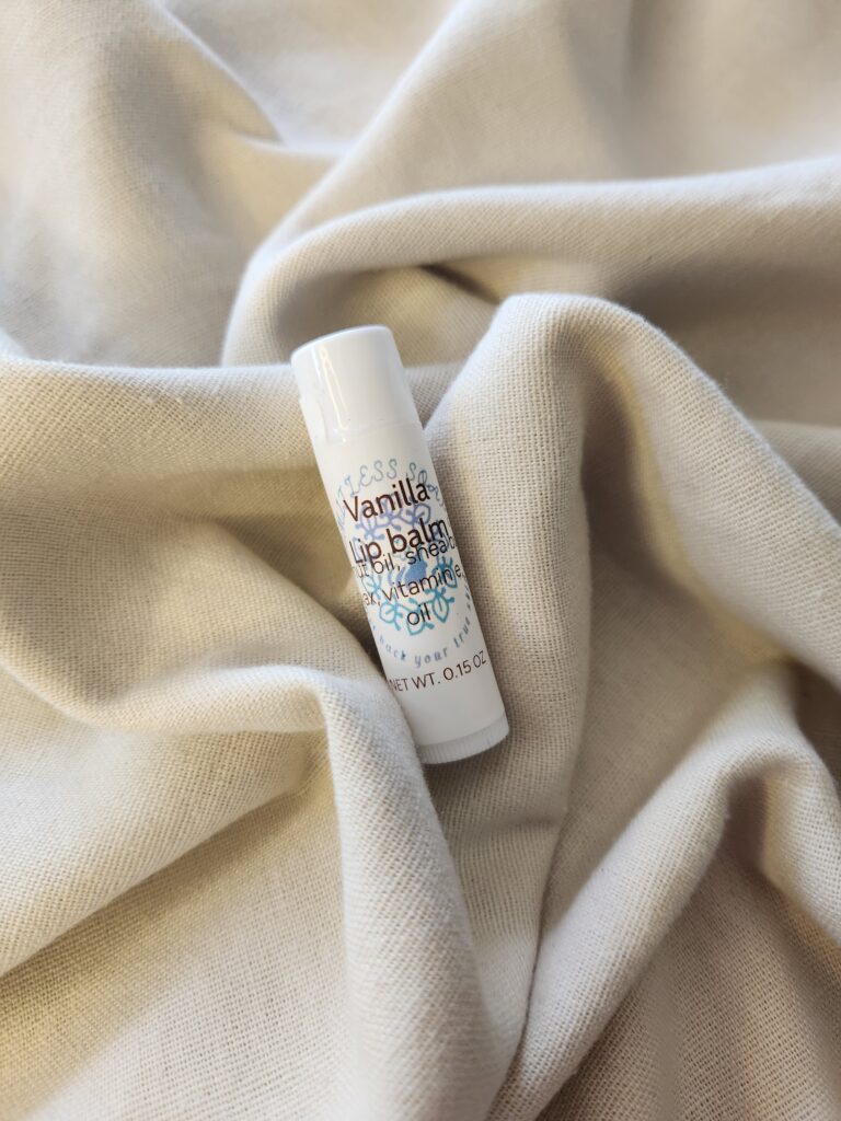lip balm container with product label