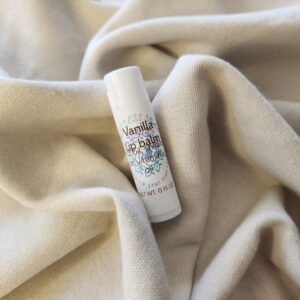 lip balm container with product label