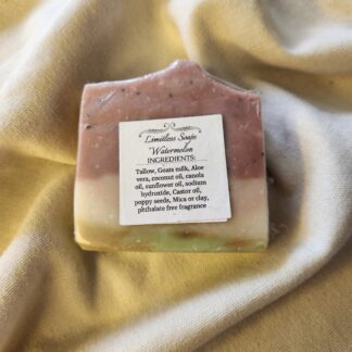 soap bar with red, white, and green stripes with product label