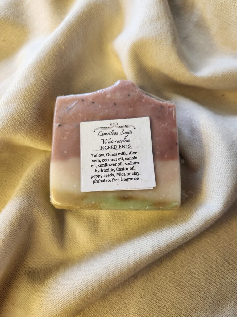 soap bar with red, white, and green stripes with product label